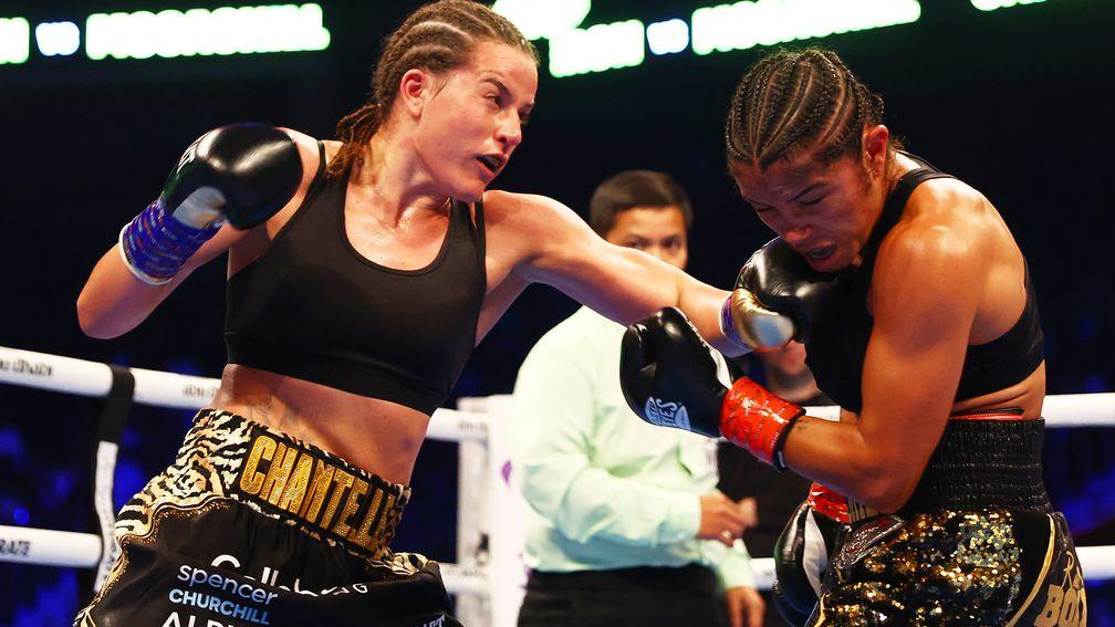 Chantelle Cameron punches Jessica McCaskill during the IBF, IBO, WBA, WBC, WBO, Undisputed Super-Lightweight Championship Title fight