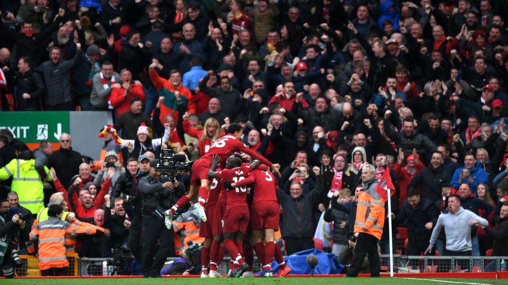 Liverpool celebrate their winning goal during against Tottenham Hotspur