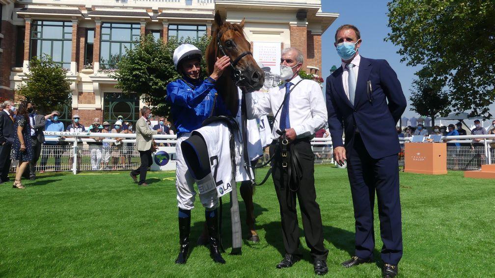 William Buick and Charlie Appleby flank Space Blues after winning the LARC Prix Maurice de Gheest at Deauville