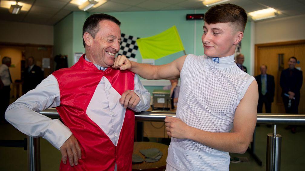 Cieren Fallon in the weighing room with father Kieren at Doncaster's St Leger meeting