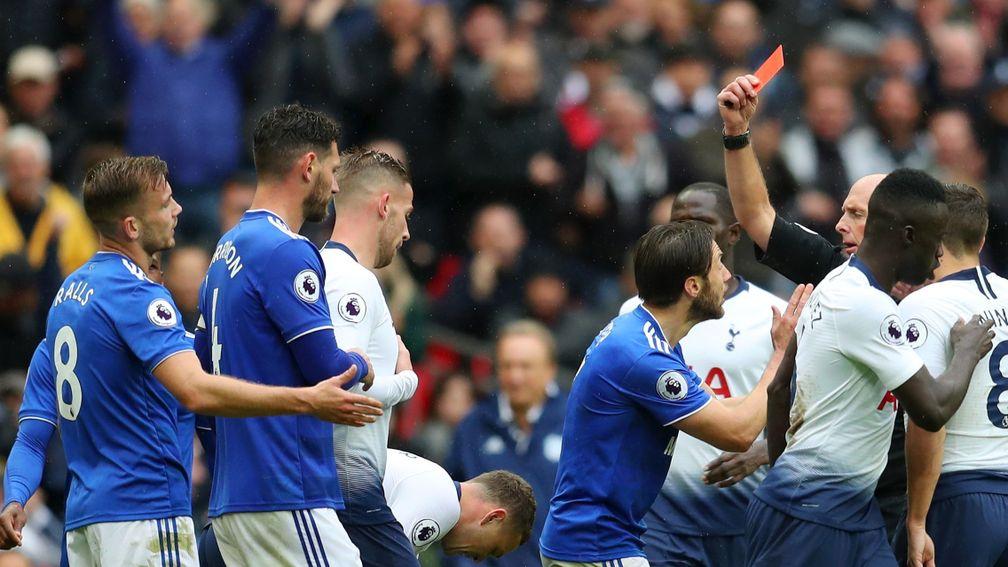 Joe Ralls (far left) is shown the red card for his cynical foul on Lucas Moura