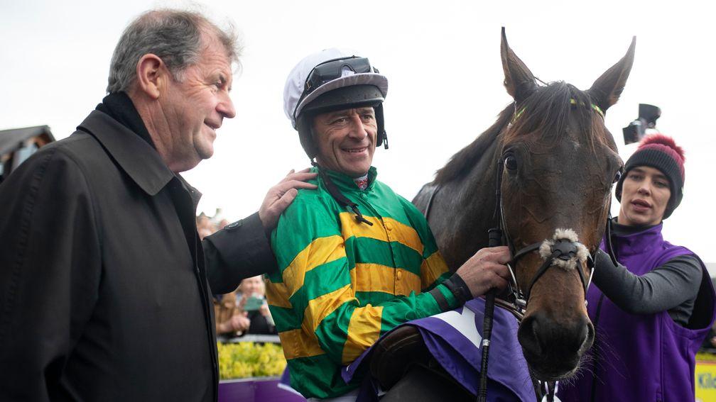 JP McManus celebrates with Davy Russell after his victory on Buveur D'Air