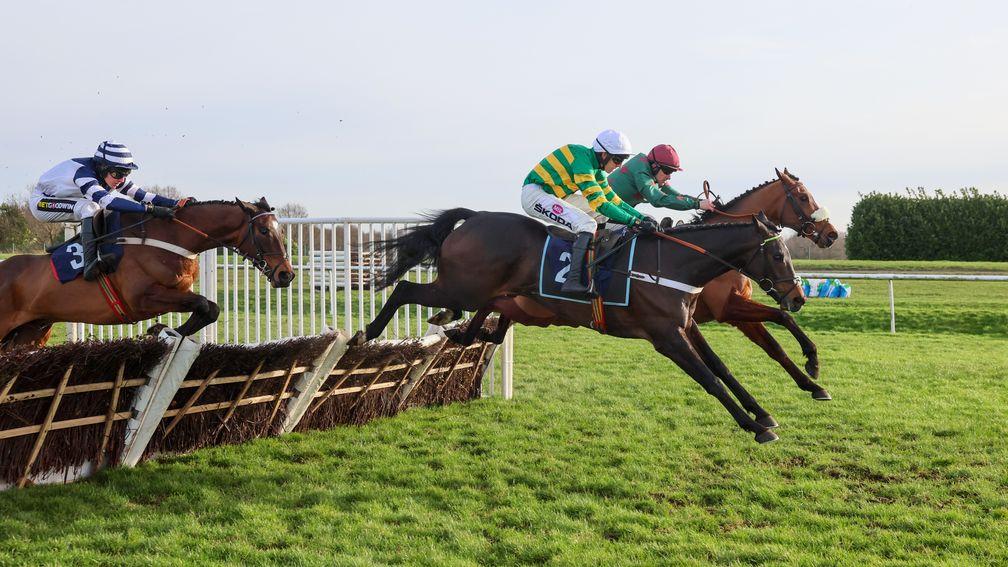 Jeriko Du Reponet (green and yellow) makes it three out of three over hurdles