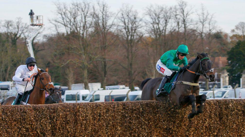 Sceau Royal (Daryl Jacob) leads Brain Power in the randoxhealth.com Henry VIII Novices' Chase at Sandown
