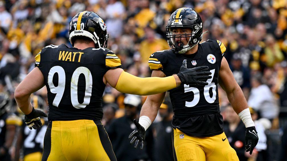 Steelers defensive stars TJ Watt and Alex Highsmith celebrate a sack 