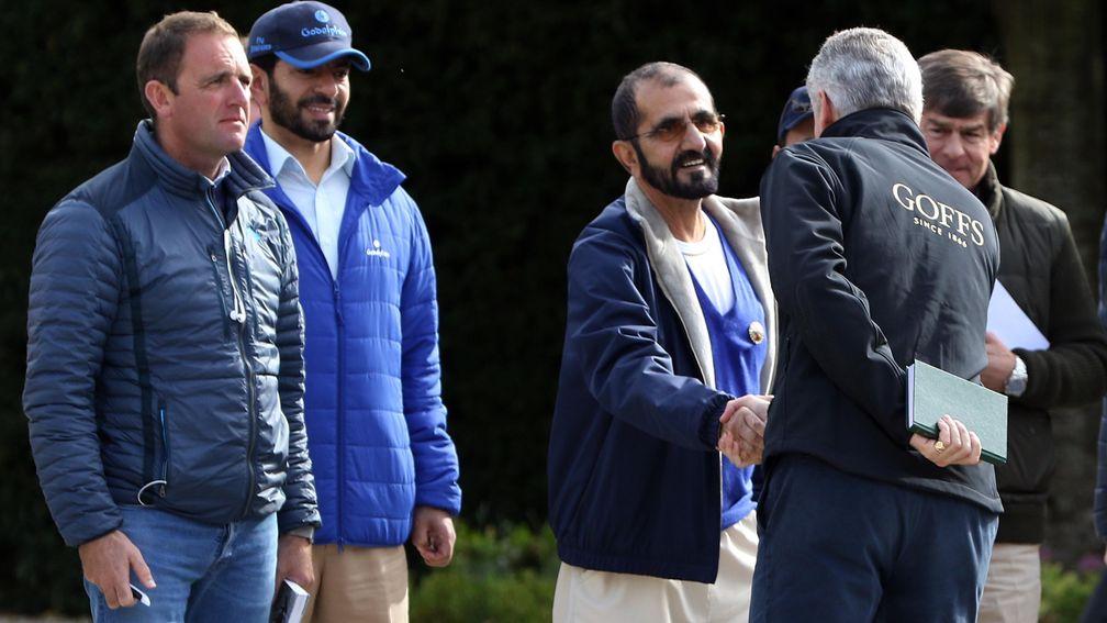 Sheikh Mohammed (centre) is greeted by Goffs Group chief executive Henry Beeby. Surrounding the sheikh is Charlie Appleby, Saeed Bin Suroor and Simon Crisford