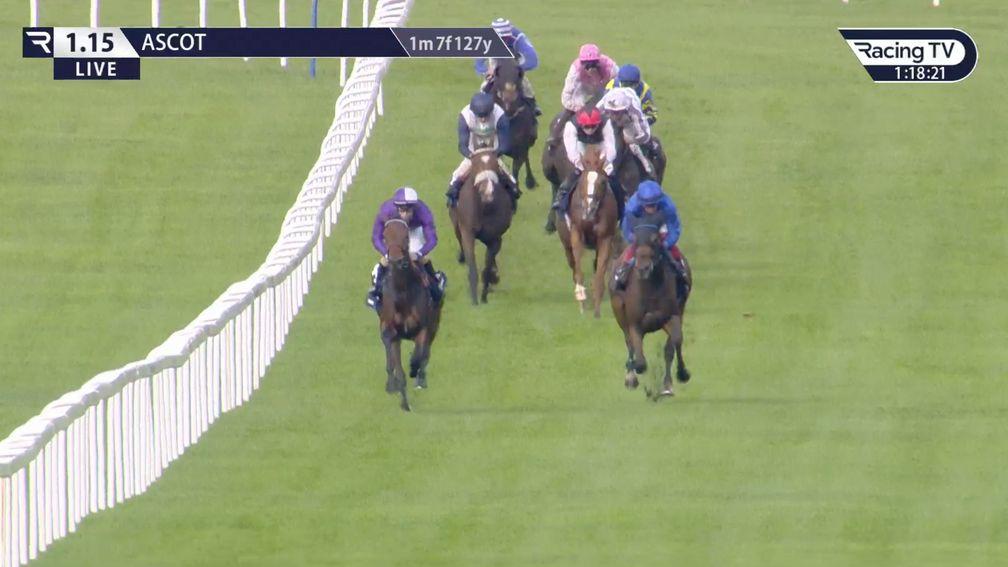 Frankie Dettori (right) on Trawlerman keeps close tabs on the front-runner Maxident and gains a lead on the remainder