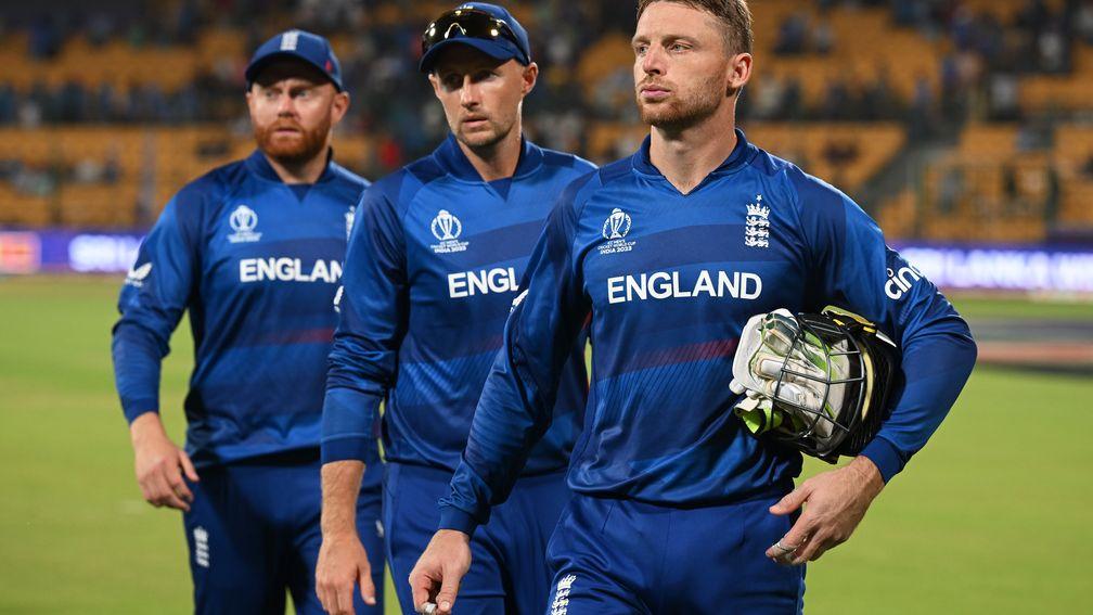Jos Buttler (right), Joe Root (centre) and Jonny Bairstow cut dejected figures following England's World Cup loss to Sri Lanka in Bangalore last week