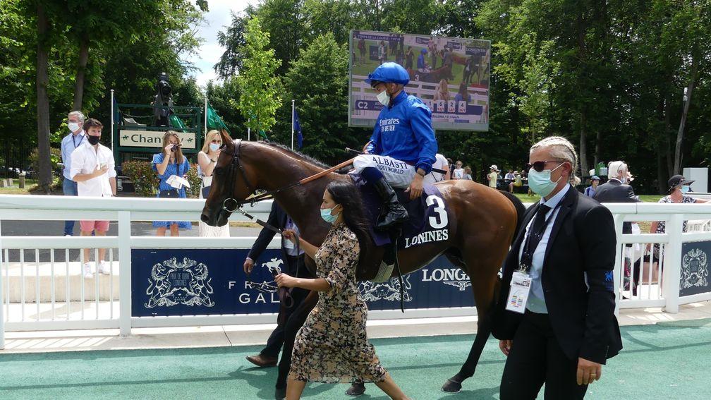 Erasmo and Mickael Barzalona return to the Chantilly winners' enclosure after winning the Group 3 Prix Paul de Moussac Longines