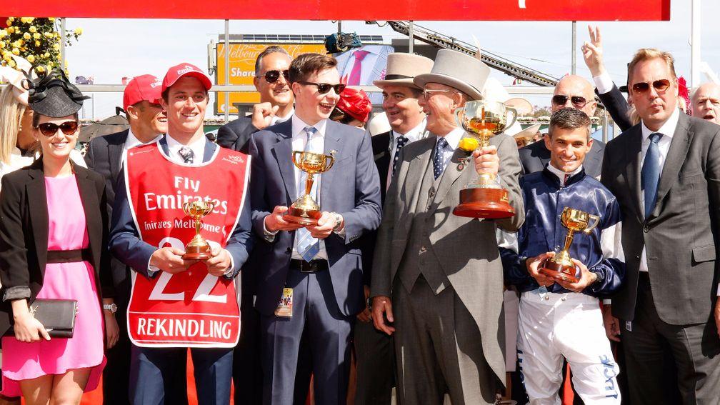 Trainer Joseph O'Brien, owner Lloyd Williams, jockey Corey Brown and Nick Williams celebrate after winning the Melbourne Cup with Rekindling at Flemington