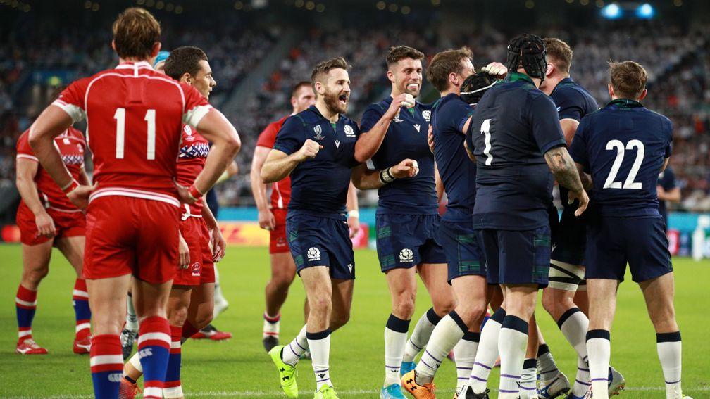 Scotland celebrate George Horne's hat-trick try against Russia at the Shizuoka Stadium