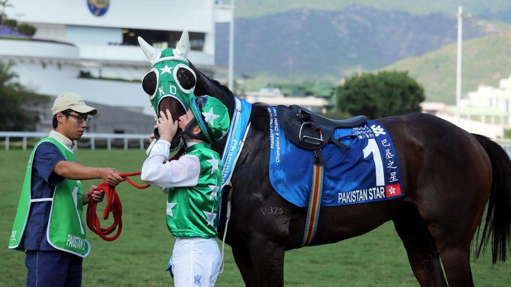 Pakistan Star and Tommy Berry after victory in the Standard Chartered Champions & Chater Cup (picture: Hong Kong Jockey Club)