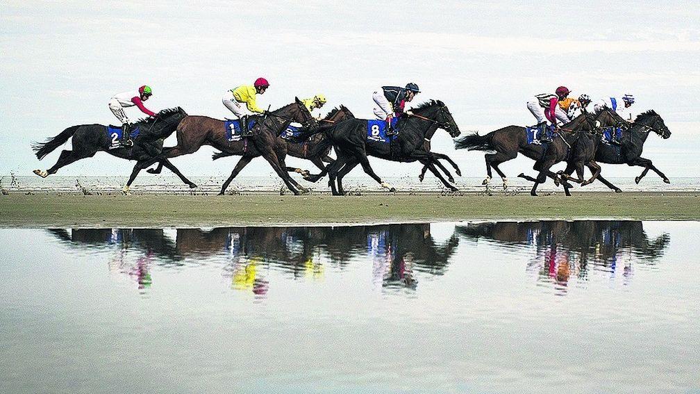 Turning the tide: Free Running (8) about to pounce for victory at Laytown