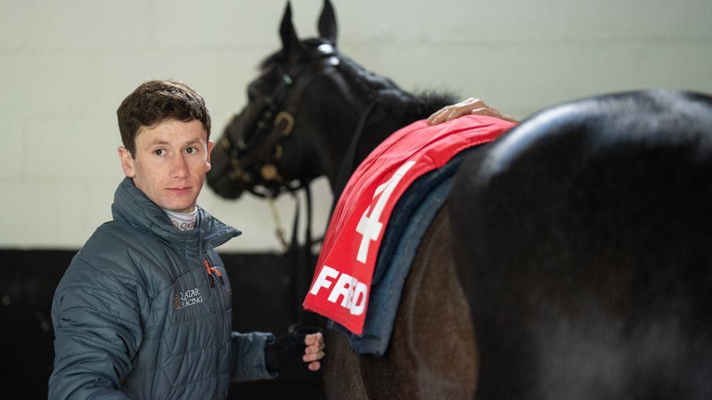 Running Lion: Oisin Murphy prepares his mount for a racecourse gallop
