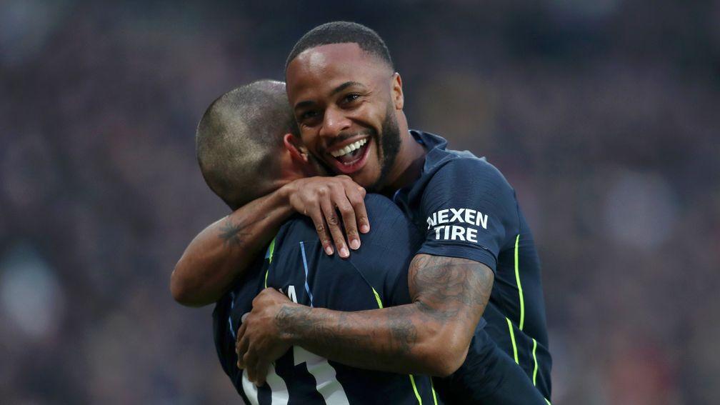 Raheem Sterling gives Man City teammate David Silva a hug