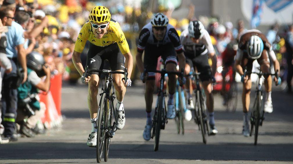 Geraint Thomas extended his lead in the yellow jersey with victory atop Alpe d'Huez