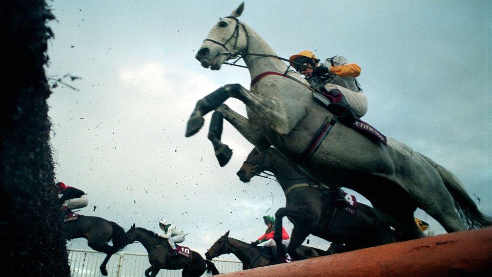 Teeton Mill( Norman Williamson) at Newbury Nov 1998 pinging an open ditch on his way to a famous victory in the Hennessy Cognac Gold Cup Steeple Chase Mirrorpix