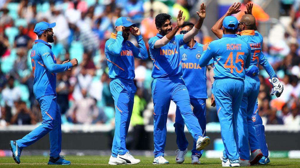 India's Jasprit Bumrah celebrates a wicket in the warm-up game against New Zealand