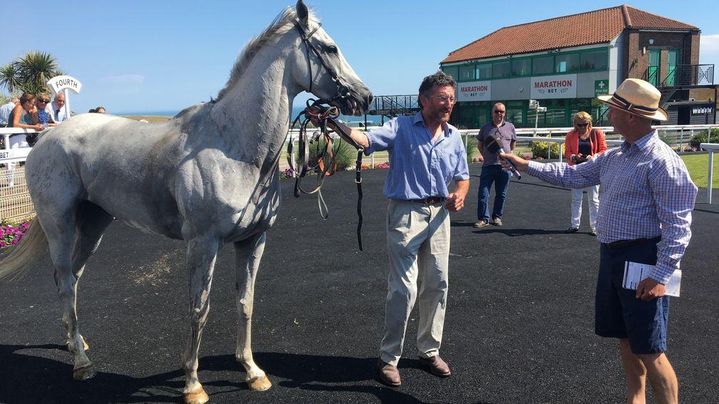 Roy Rocket and his devoted trainer John Berry bask in the Brighton sunshine last week