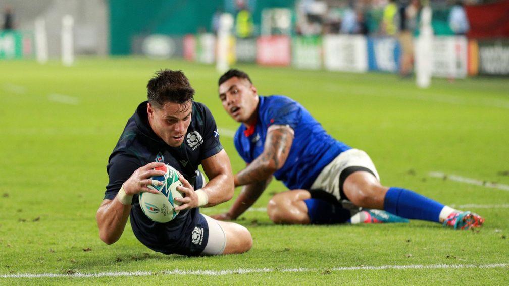 Sean Maitland stretched over for Scotland;s first try in their win over Samoa in Kobe
