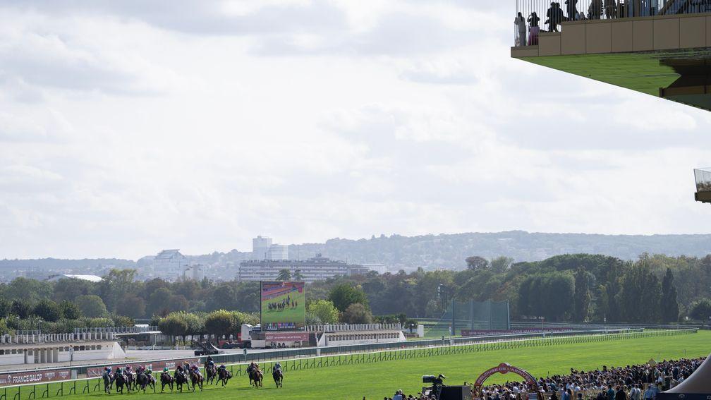 Racegoers watch the action at Longchamp on Saturday