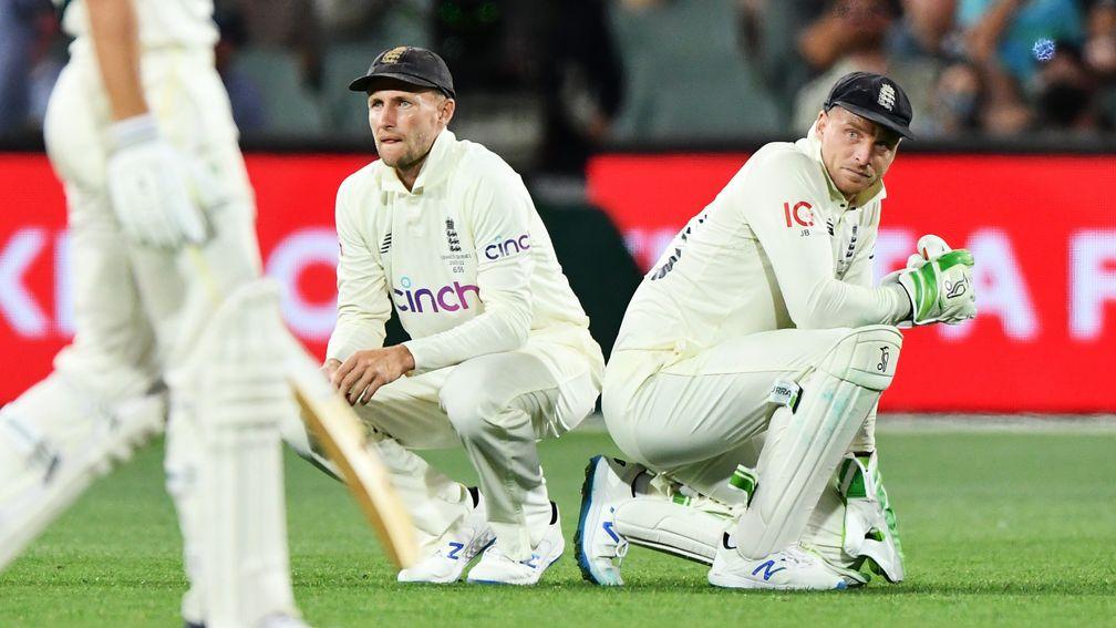 England captain Joe Root (left) and wicket-keeper Jos Buttler react to the drop of Marnus Labuschagne