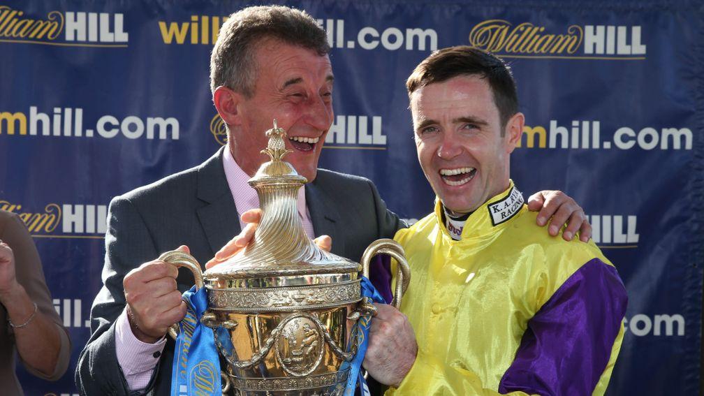 Kevin Ryan stands alongside Tom Eaves after winning the 2016 Ayr Gold Cup with Brando.