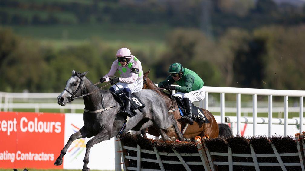 Lossiemouth leads stablemate Zarak The Brave on her way to victory in the Champion Four Year Old Hurdle