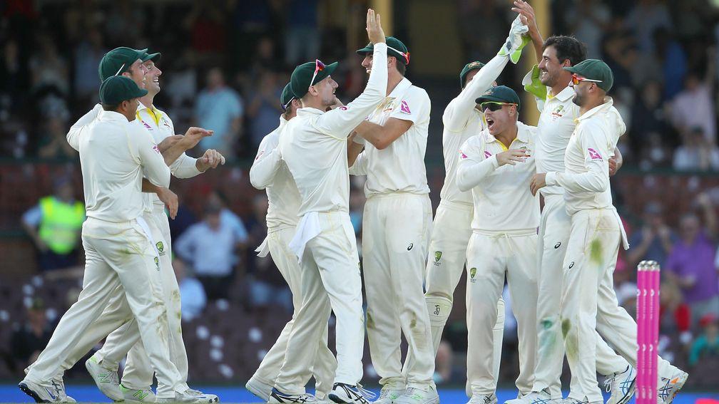Australia celebrate the wicket of Joe Root in Sydney