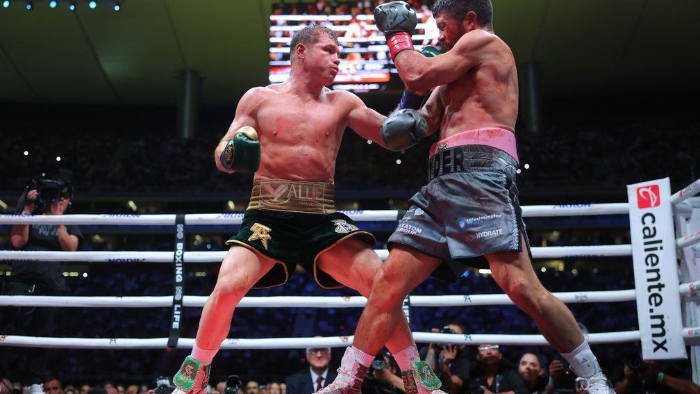 Canelo Alvarez (left) on his way to victory over John Ryder in May