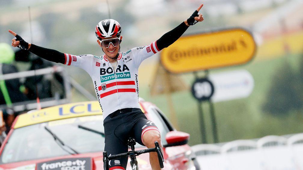 Patrick Konrad of Austria celebrates victory on stage 16 of the Tour de France