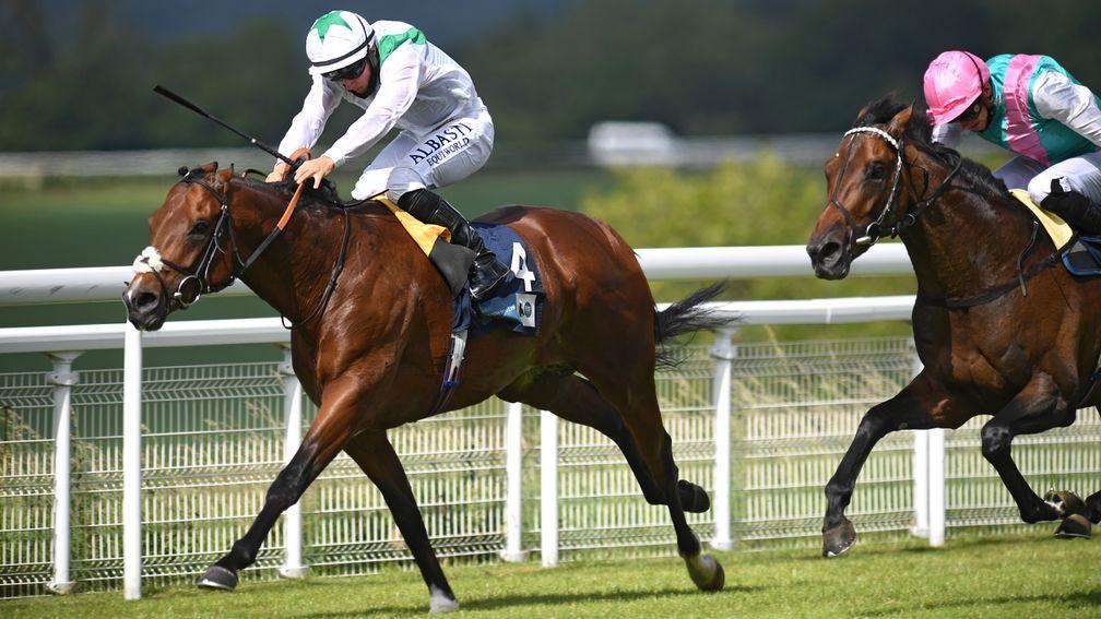 CHICHESTER, ENGLAND - JUNE 14: Khalifa Sat ridden by Tom Marquand hold off the challenge of the favourite, Emissary ridden by James Doyle to win the Coral/British EBF Cocked Hat Stakes at Goodwood Racecourse on June 14, 2020 in Chichester, England. Photo