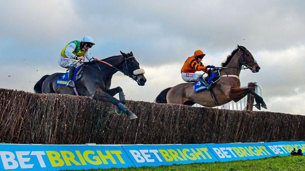 Many Clouds (left) en route to beating Thistlecrack in the Cotswold Chase at Cheltenham