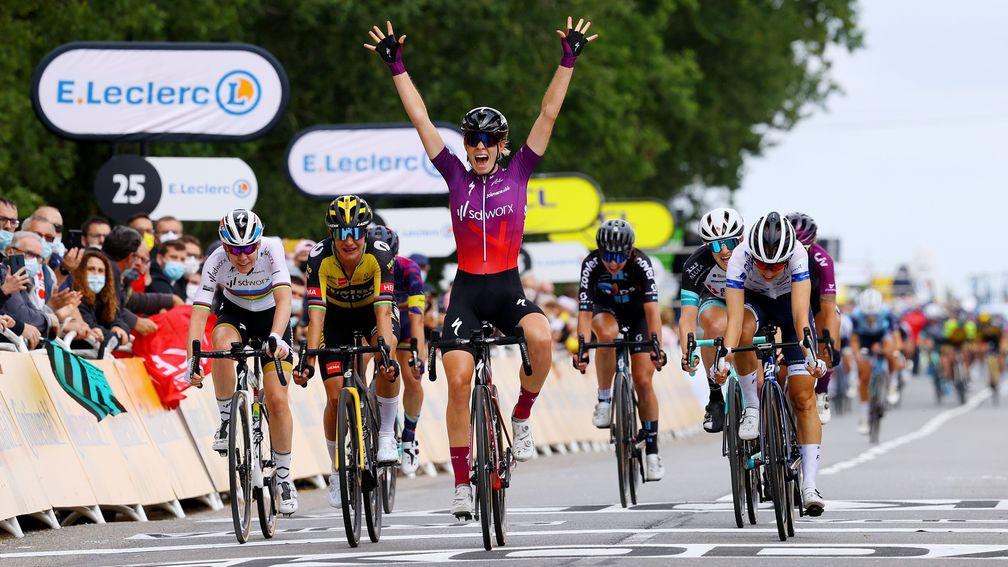 Dutch star Demi Vollering celebrates her win at La Course by Le Tour de France