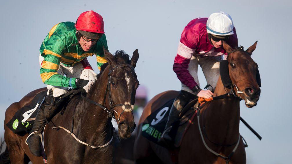Pulsating nish: Joseph O’Brien’s Edwulf (left), the mount of Derek O’Connor, gets the better of Outlander in the Grade 1 Unibet Irish Gold Cup