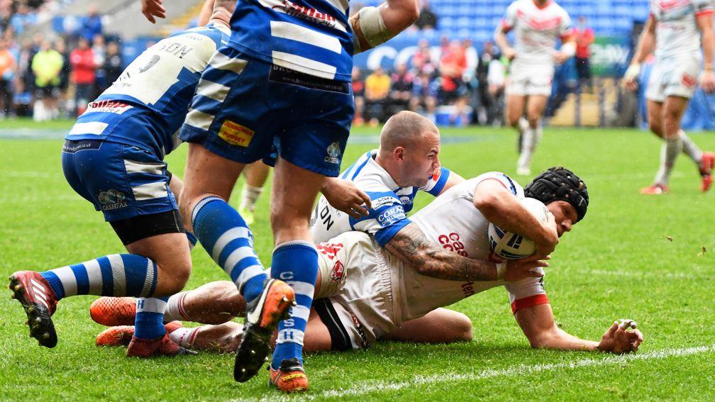 St Helens' Jonny Lomax scores a try during the Coral Challenge Cup semi-final win over Halifax