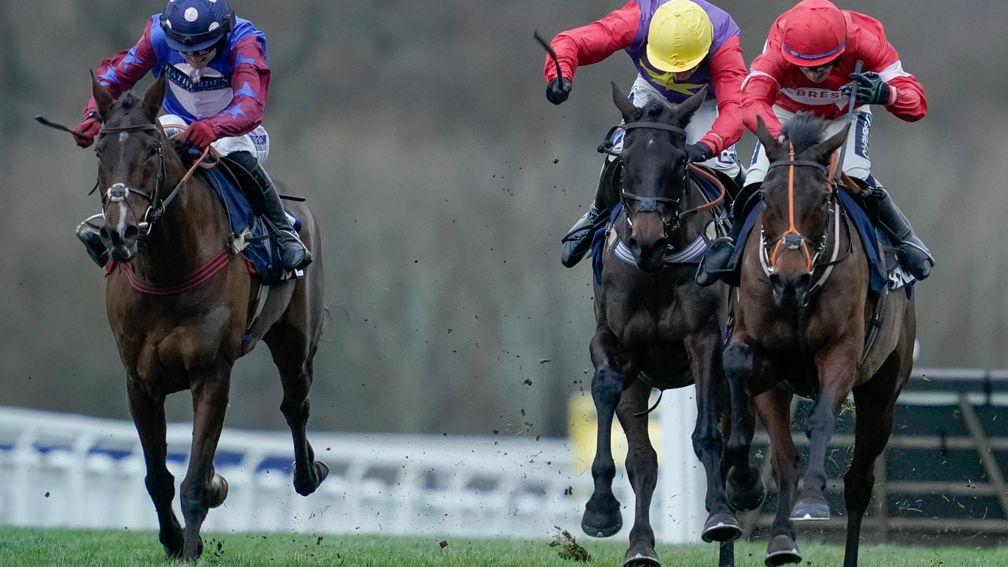 Crambo (right) denies Paisley Park (left) and the veteran's legion of supporters with a last-gasp success in the Long Walk Hurdle 