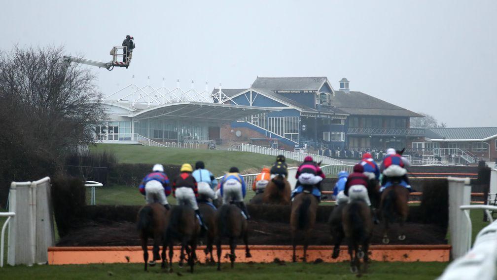 Fumet D'Oudairies (third left) stalks the leaders before winning at Leicester on Tuesday