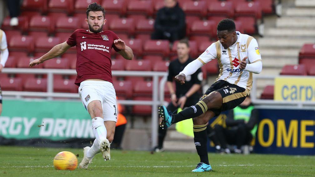 Kieran Agard (right) has been in red-hot form for Milton Keynes Dons