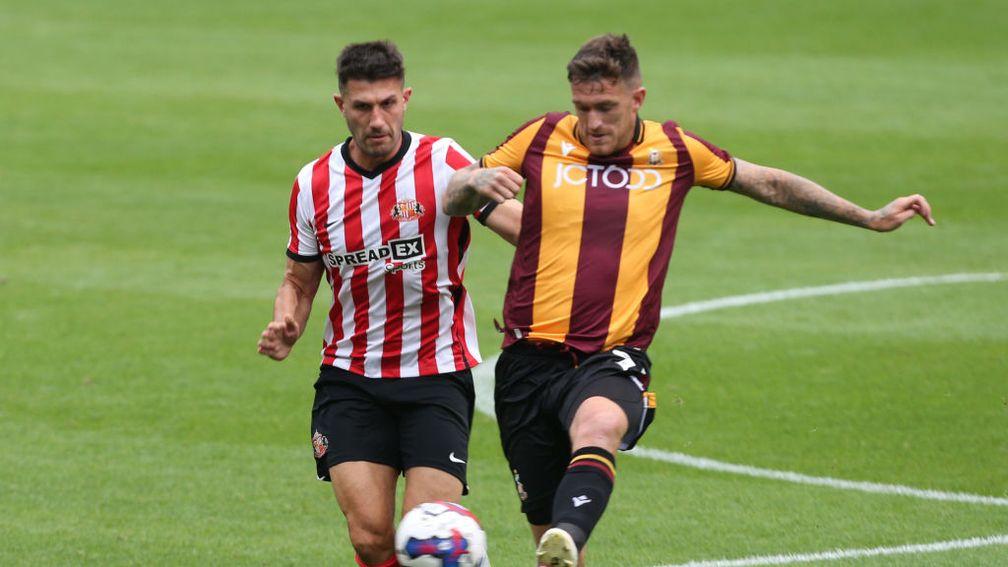 Bradford striker Andy Cook (right) can help his team avoid defeat at Notts County
