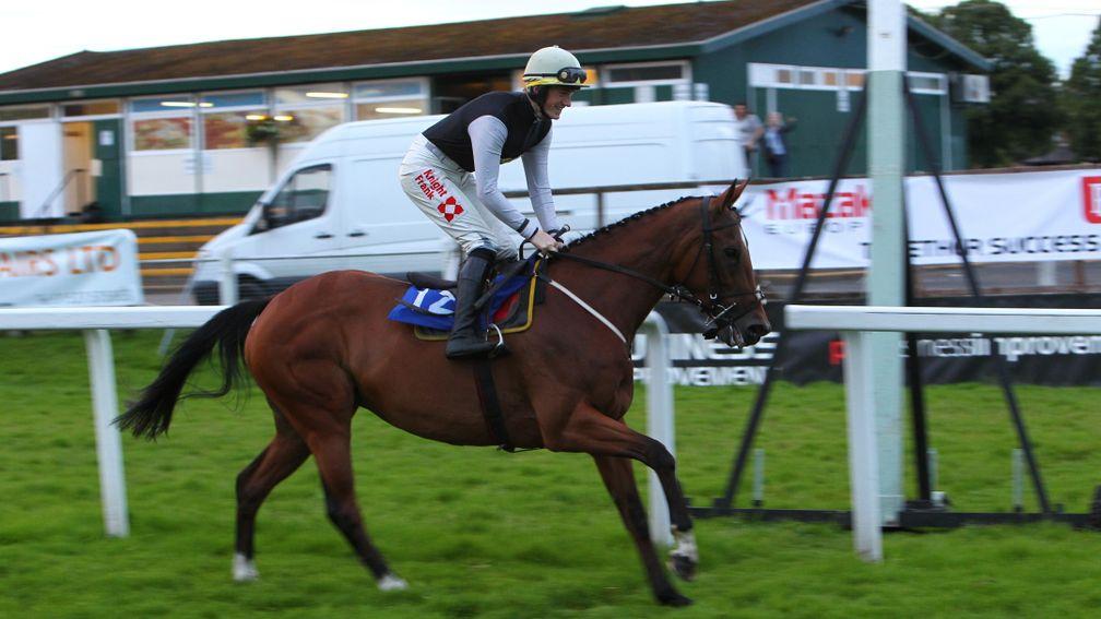 Sam Twiston-Davies celebrates a walkover victory with Moulin De La Croix at Worcester in 2012