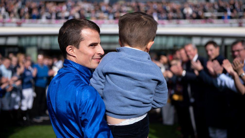 William Buick pictured with his son Thomas at Ascot in October 2022