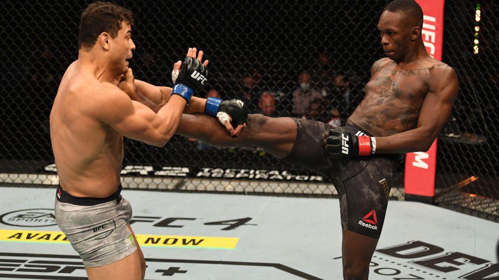 Israel Adesanya sticks the boot into Paulo Costa at UFC 253