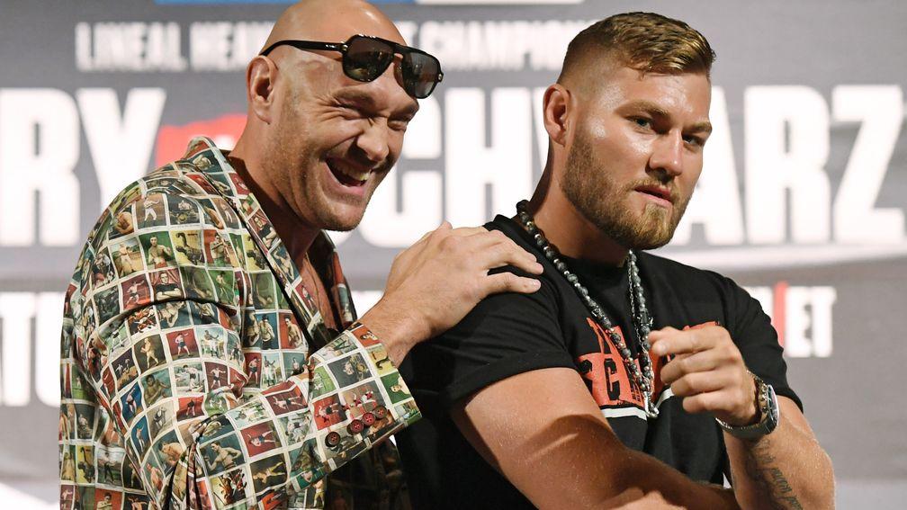 Tyson Fury (left) and Tom Schwarz pose during their news conference at the MGM Grand in Las Vegas