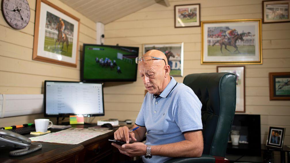 Jockeys agent , Tony Hind working in his alpine style garden office at his home in Fordham near Newmarket 13.8.20 Pic: Edward Whitaker