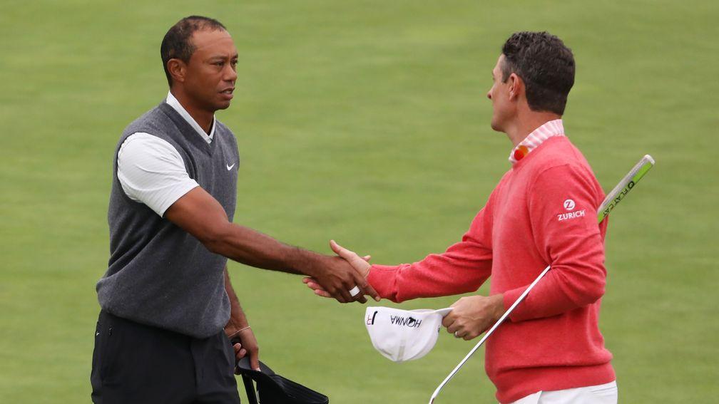 Tiger Woods congratulates Justin Rose on his opening 65 at the US Open in Pebble Beach