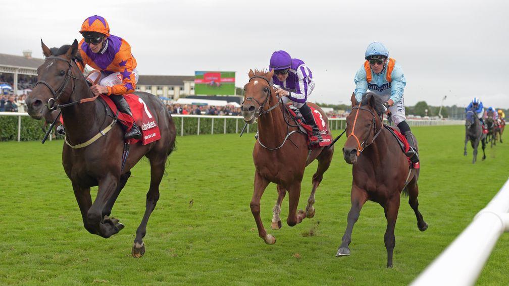 Ventura Storm (right) is caught in the final strides of the St Leger