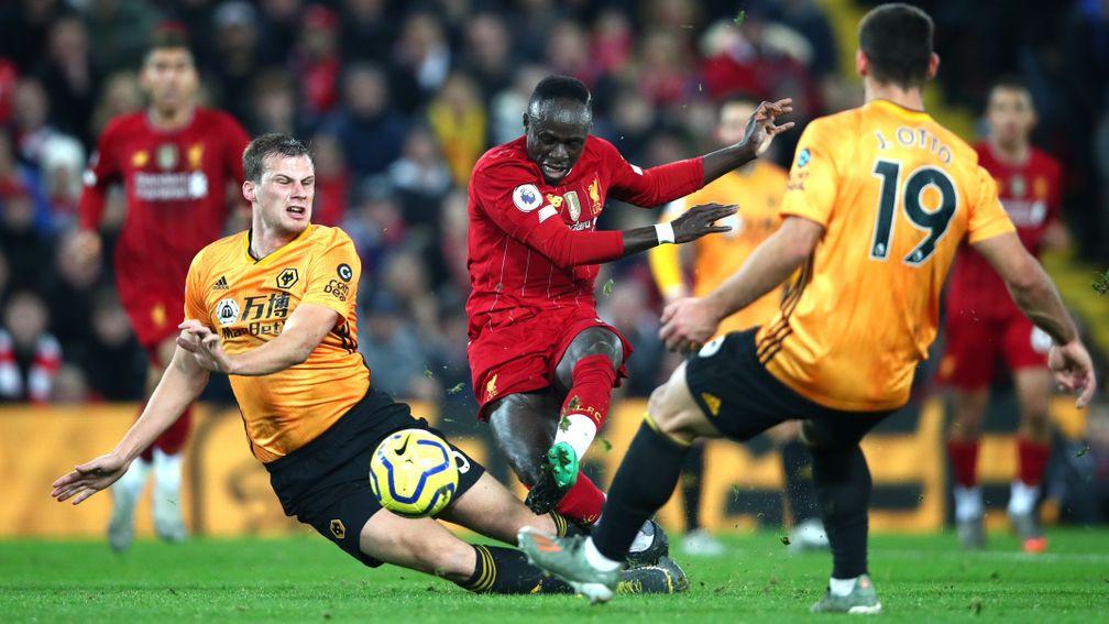 Sadio Mane of Liverpool is closed down by the Wolves defence