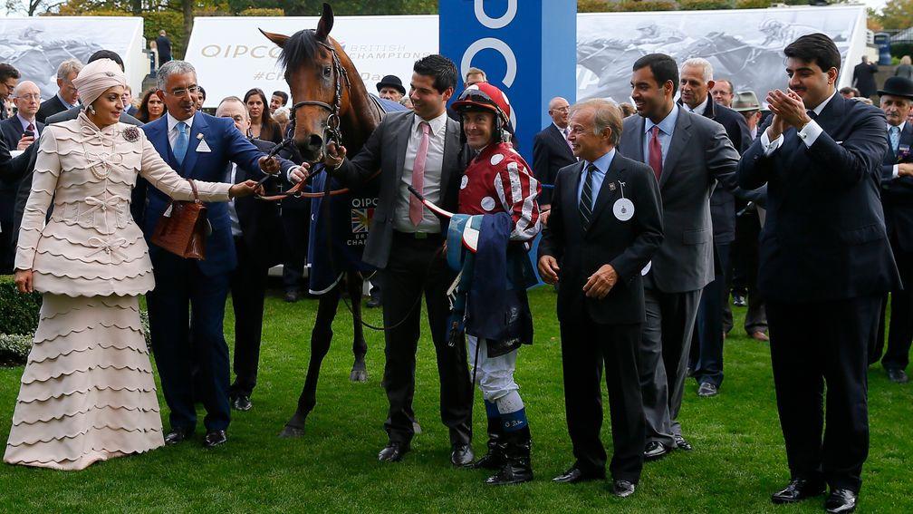 Sheikh Abdulla Bin Khalifa Al Thani (second left) with Charm Spirit after winning the QEII Stakes at Ascot in 2014