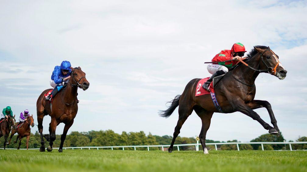 ESHER, ENGLAND - JULY 23: Pat Dobbs riding Etonian (red/green) win The Martin Densham Memorial EBF Maiden Stakes at Sandown Park Racecourse on July 23, 2020 in Esher, England. Owners are allowed to attend if they have a runner at the meeting otherwise rac